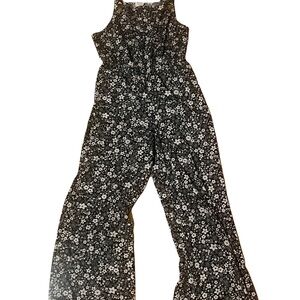 Girls Romper. Black and White floral pattern. Size 10. Stretchy and comfy.